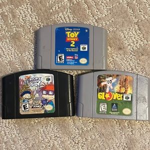Random n64 bundle; rugrats in paris, glover, Toy Story 2